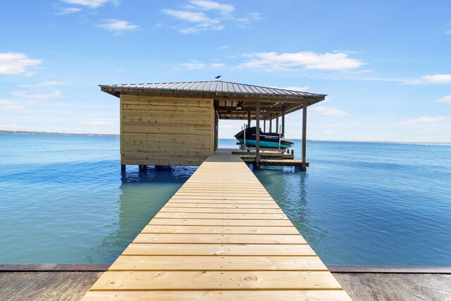 246 Indian Falls Ln, Livingston, TX 77351 - dock featuring boat lift and a water view