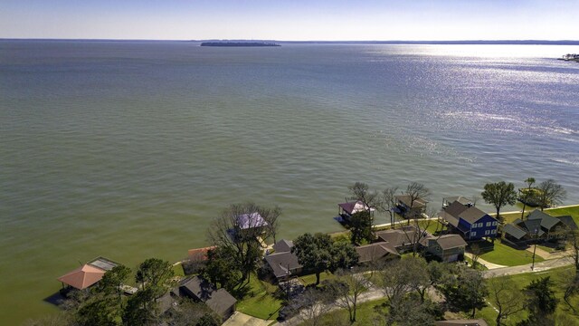 246 Indian Falls Ln, Livingston, TX 77351 - aerial overview of property's location featuring a large body of water and nearby suburban area