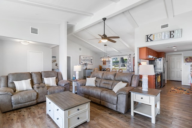 246 Indian Falls Ln, Livingston, TX 77351 - living room with a ceiling fan, beamed ceiling, wood finished floors, and high vaulted ceiling