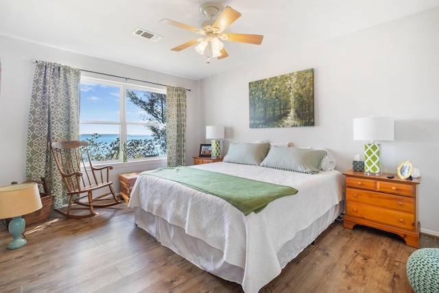 246 Indian Falls Ln, Livingston, TX 77351 - bedroom featuring wood finished floors and ceiling fan