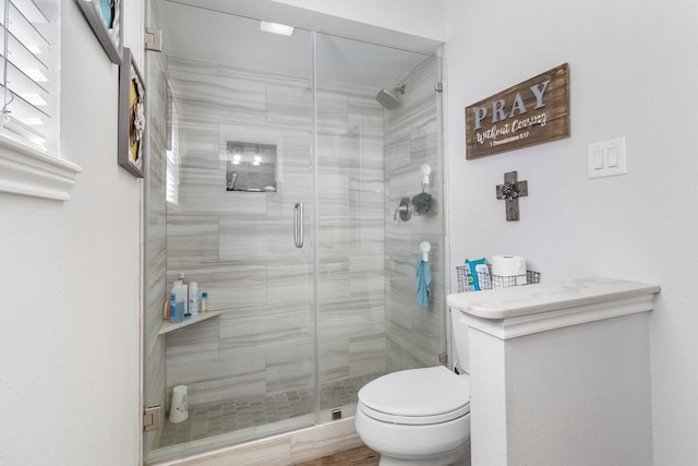 246 Indian Falls Ln, Livingston, TX 77351 - bathroom featuring toilet and a shower stall