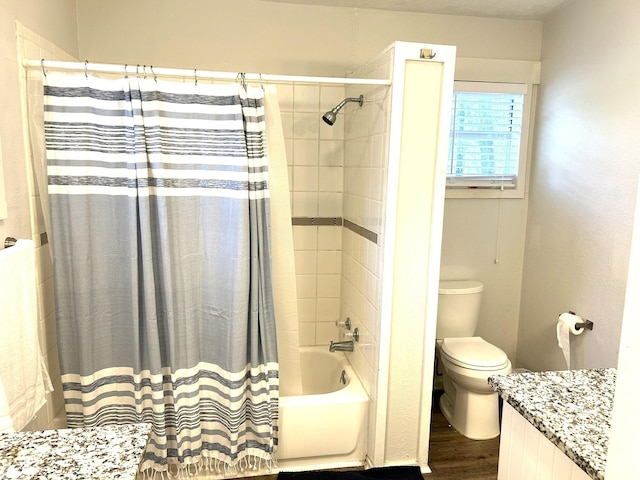 320 Deer Run Rd, Trinity, TX 75862 - bathroom with wood finished floors, toilet, shower / bath combination with curtain, and vanity