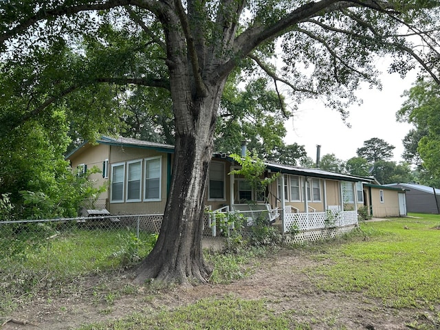 320 Deer Run Rd, Trinity, TX 75862 - view of front facade with covered porch