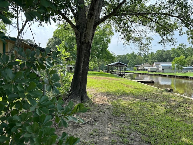 320 Deer Run Rd, Trinity, TX 75862 - view of green lawn with a water view