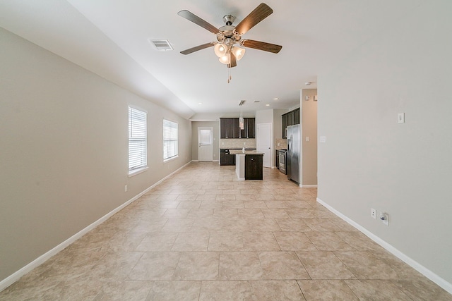 1603 N City Oaks Ln, Houston, TX 77047 - unfurnished living room with ceiling fan, baseboards, and light tile patterned floors