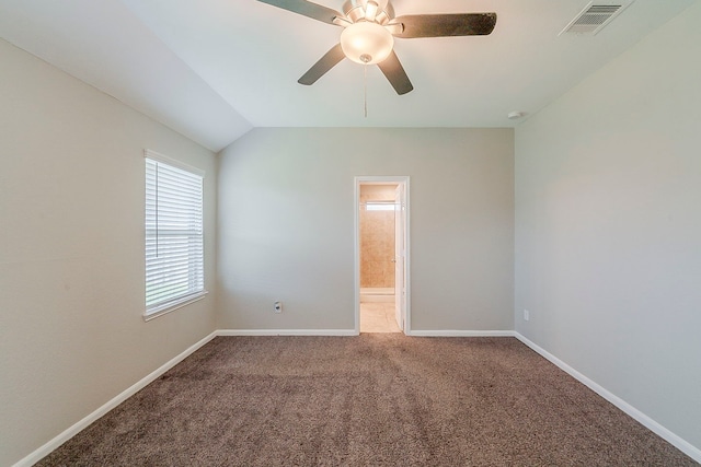 1603 N City Oaks Ln, Houston, TX 77047 - carpeted spare room featuring ceiling fan, baseboards, and vaulted ceiling