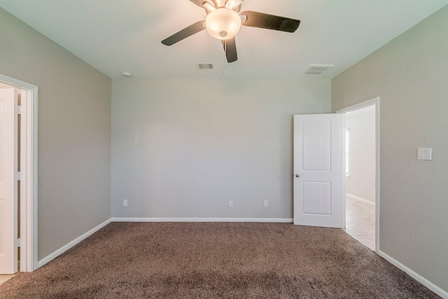 1603 N City Oaks Ln, Houston, TX 77047 - unfurnished bedroom featuring carpet floors, baseboards, and a ceiling fan