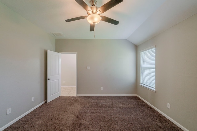 1603 N City Oaks Ln, Houston, TX 77047 - carpeted spare room with ceiling fan, baseboards, and vaulted ceiling