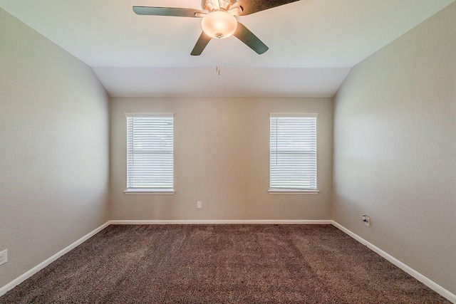 1603 N City Oaks Ln, Houston, TX 77047 - empty room featuring vaulted ceiling, plenty of natural light, dark carpet, ceiling fan, and baseboards
