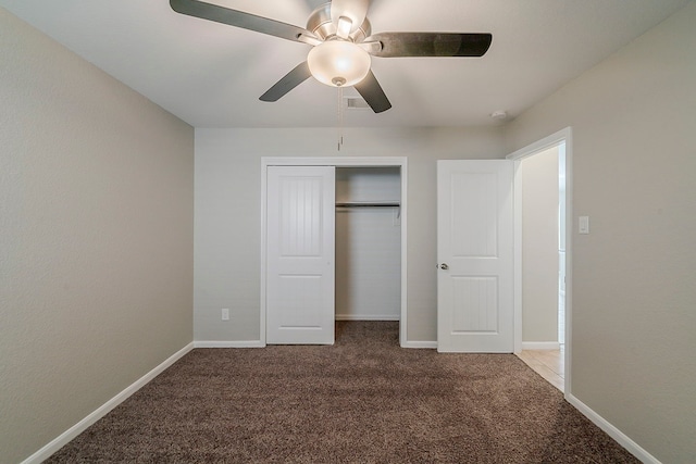 1603 N City Oaks Ln, Houston, TX 77047 - unfurnished bedroom featuring carpet, a closet, a ceiling fan, and baseboards
