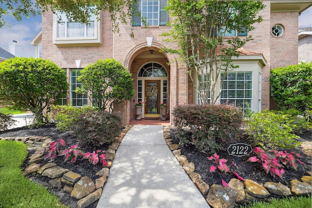 2122 Misty River Trl, Kingwood, TX 77345 - property entrance with brick siding