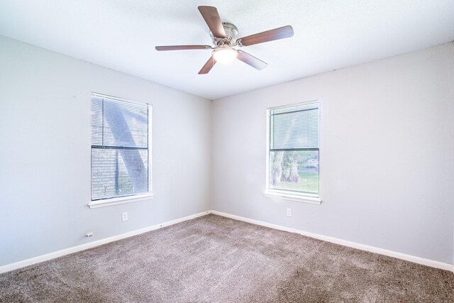 828 Noreda St, Angleton, TX 77515 - carpeted spare room with healthy amount of natural light, baseboards, and ceiling fan