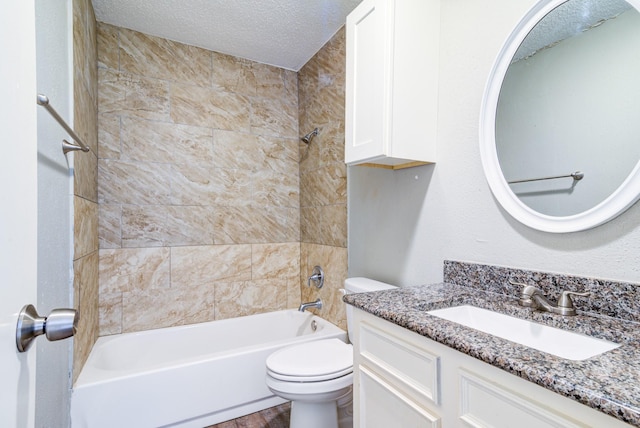 828 Noreda St, Angleton, TX 77515 - bathroom with vanity, toilet,  shower combination, a textured ceiling, and wood finished floors