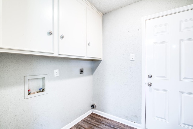 828 Noreda St, Angleton, TX 77515 - washroom with baseboards, hookup for an electric dryer, cabinet space, hookup for a washing machine, and dark wood-type flooring
