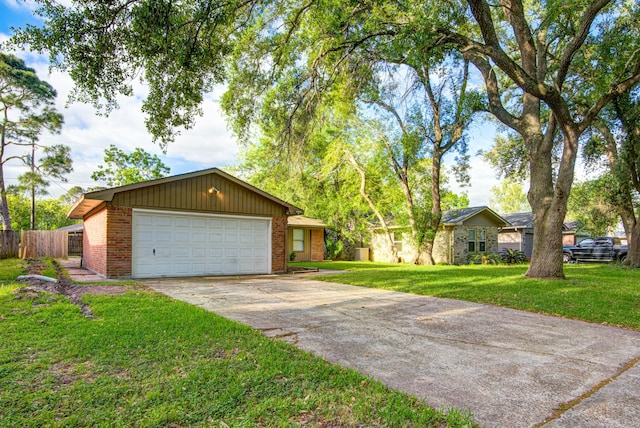 828 Noreda St, Angleton, TX 77515 - view of front of property with brick siding and concrete driveway
