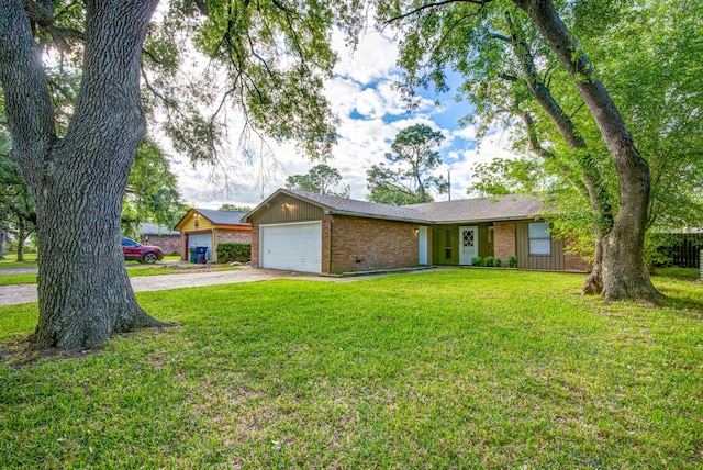 828 Noreda St, Angleton, TX 77515 - single story home featuring brick siding, concrete driveway, an attached garage, a front lawn, and board and batten siding