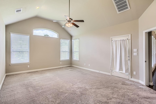 2044 Doolan Dr, Conroe, TX 77301 - unfurnished room featuring ceiling fan, vaulted ceiling, carpet, and plenty of natural light