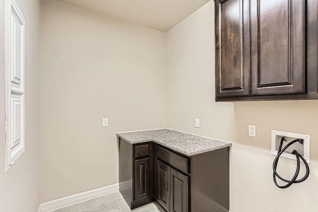 2044 Doolan Dr, Conroe, TX 77301 - washroom featuring washer hookup, cabinet space, and baseboards