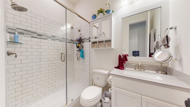 2002 Village Orchard Ln, Katy, TX 77423 - bathroom featuring toilet, a shower stall, and vanity