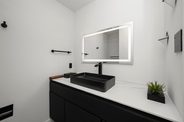 5555 Del Monte Dr Unit 103, Houston, TX 77056 - bathroom with vanity and baseboards
