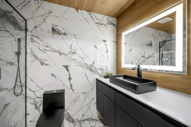 5555 Del Monte Dr Unit 103, Houston, TX 77056 - bathroom with vanity, a marble finish shower, wood ceiling, and toilet