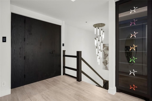 5555 Del Monte Dr Unit 103, Houston, TX 77056 - entryway with wood finished floors