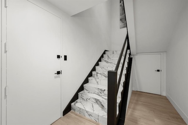 5555 Del Monte Dr Unit 103, Houston, TX 77056 - stairs with wood finished floors and baseboards
