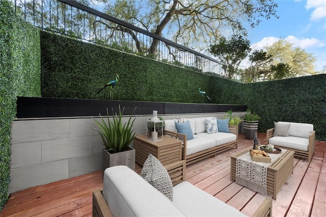 5555 Del Monte Dr Unit 103, Houston, TX 77056 - wooden terrace featuring an outdoor living space and a fenced backyard