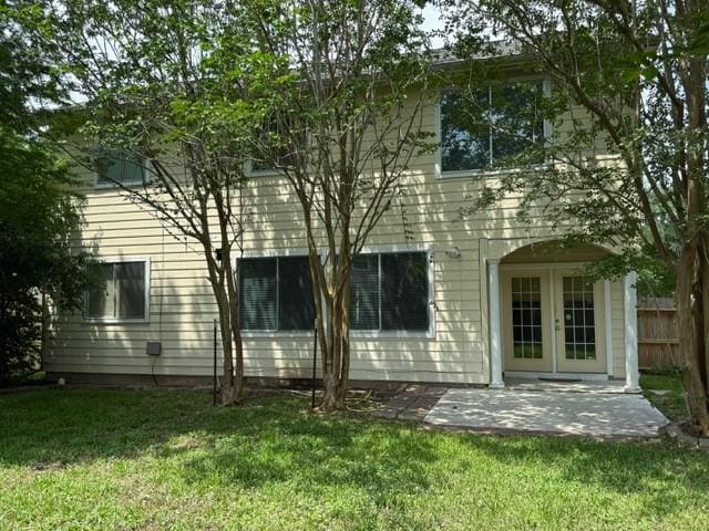 1119 Autumn Green Dr, Missouri City, TX 77459 - back of property featuring a patio area and french doors