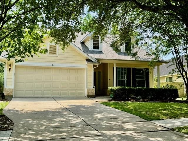 1119 Autumn Green Dr, Missouri City, TX 77459 - view of front facade featuring concrete driveway and a garage