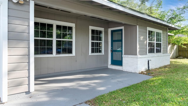 306 W Wilkins St, League City, TX 77573 - view of exterior entry featuring a patio