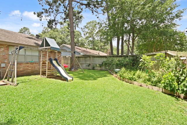 14922 Sandy Creek Dr, Houston, TX 77070 - view of yard with a playground