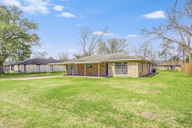 1406 W Talmage St, Alvin, TX 77511 - view of front of house featuring concrete driveway, a carport, and cooling unit