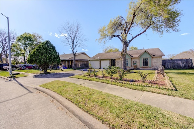 1311 Bournemouth Dr, Pasadena, TX 77504 - ranch-style home featuring driveway and an attached garage
