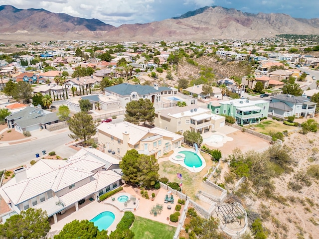 6574 Eagle Ridge Dr, El Paso, TX 79912 - aerial perspective of suburban area with a pool and mountains