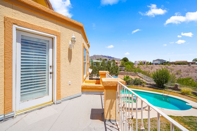 6574 Eagle Ridge Dr, El Paso, TX 79912 - balcony with view of pool area and a mountain view