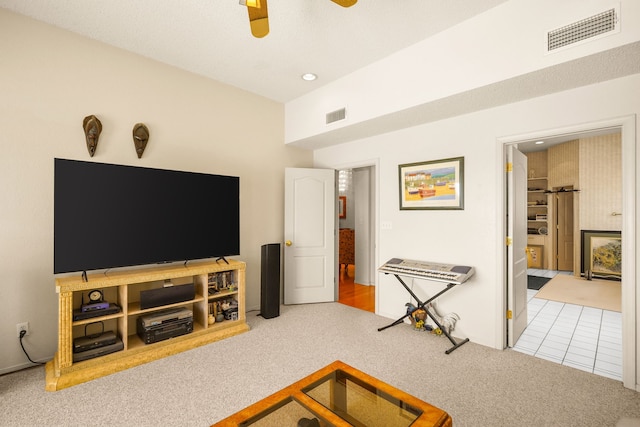 6574 Eagle Ridge Dr, El Paso, TX 79912 - carpeted living area featuring ceiling fan, recessed lighting, and tile patterned floors