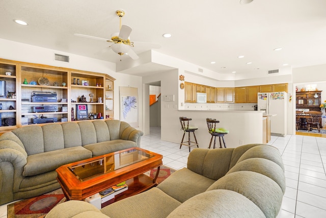 6574 Eagle Ridge Dr, El Paso, TX 79912 - living room featuring light tile patterned floors, ceiling fan, and recessed lighting