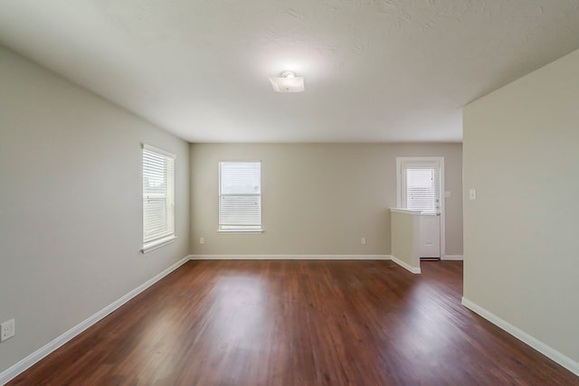 722 Horseshoe Springs Ln, Houston, TX 77090 - spare room with dark wood finished floors and baseboards