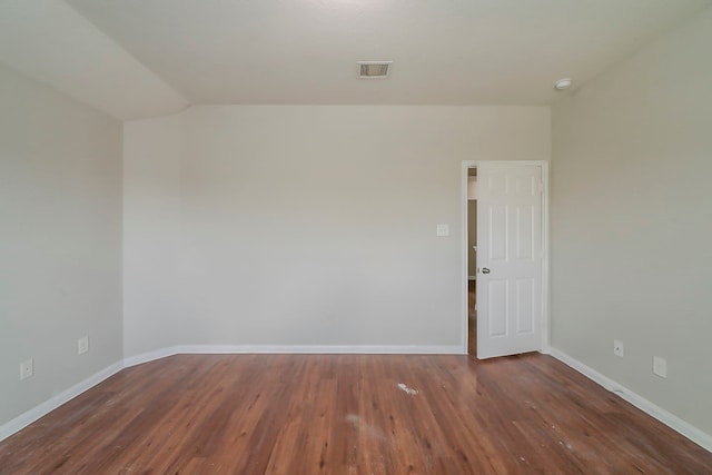 722 Horseshoe Springs Ln, Houston, TX 77090 - unfurnished room with wood finished floors, baseboards, and lofted ceiling