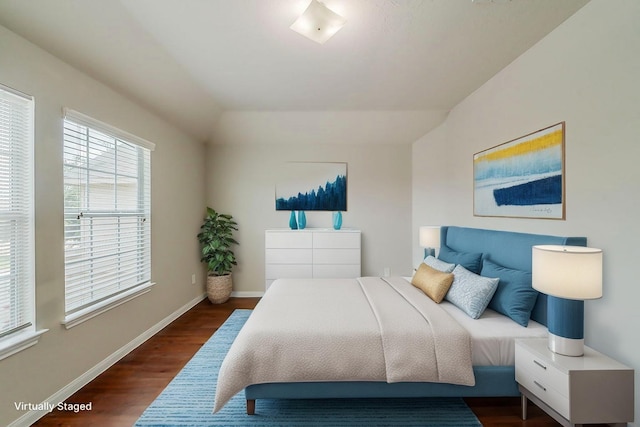 722 Horseshoe Springs Ln, Houston, TX 77090 - bedroom with dark wood-type flooring and baseboards