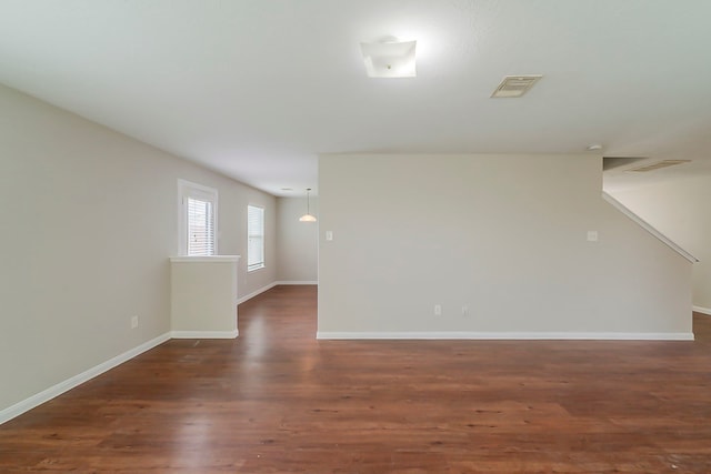722 Horseshoe Springs Ln, Houston, TX 77090 - empty room with dark wood-style floors and baseboards