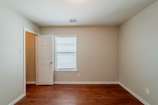 722 Horseshoe Springs Ln, Houston, TX 77090 - empty room with wood finished floors and baseboards