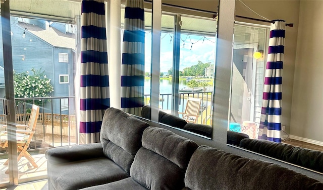 12500 Melville Dr Unit 233D, Montgomery, TX 77356 - living area with a water view and wood finished floors