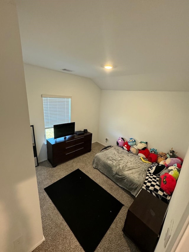 10026 Rose Mallow Ln, Magnolia, TX 77354 - carpeted bedroom featuring lofted ceiling and baseboards