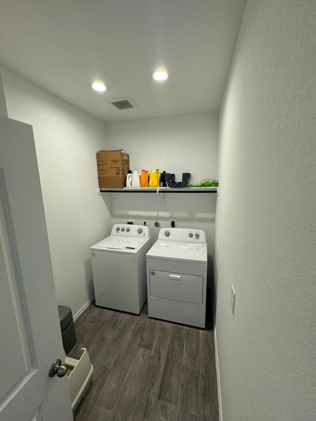 10026 Rose Mallow Ln, Magnolia, TX 77354 - washroom featuring washer and dryer, dark wood finished floors, recessed lighting, and baseboards