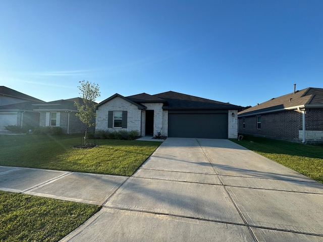 10026 Rose Mallow Ln, Magnolia, TX 77354 - single story home with an attached garage, a front yard, concrete driveway, and brick siding