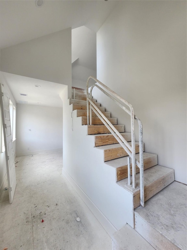 14007 Memorial Reserve Pl, Houston, TX 77079 - stairs featuring concrete floors