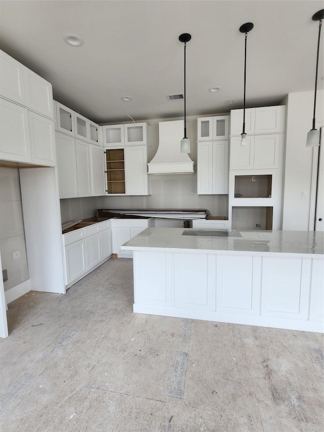14007 Memorial Reserve Pl, Houston, TX 77079 - kitchen featuring custom exhaust hood, white cabinets, and glass insert cabinets