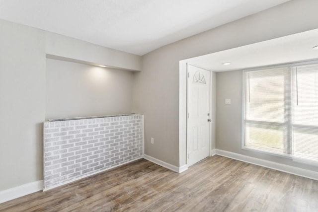 208 Preston St, La Marque, TX 77568 - unfurnished room with wood finished floors and baseboards